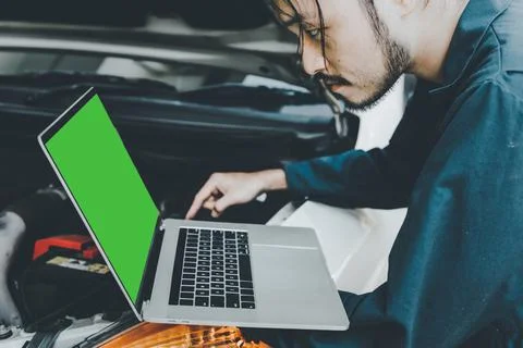 Mechanic Engineer is Diagnosing Car Engine and Electric Adjusting Transmissio Stock Photos