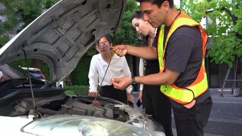 Mechanic engineer helping group of diversity business woman repair or fix c.. Stock Footage 252956019
