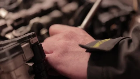 Mechanic Fastening Bolt in Engine Stock Footage 261719017