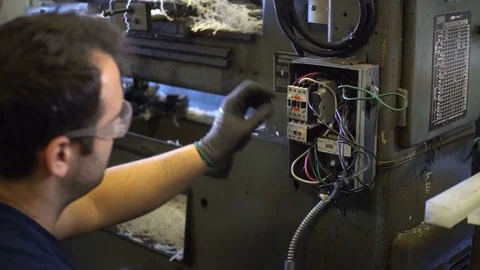 Mechanic Fixing Circuit Board Stock Footage 75290732