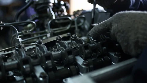 Mechanic Fixing Engine Block Video stock 123082763