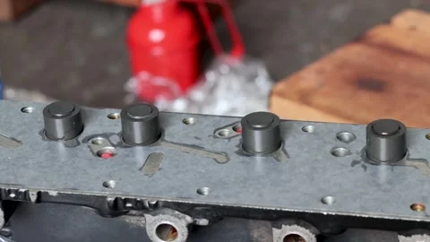 Mechanic Hand Inserting Spool Valve Shaft Into Hydraulic Control Valve Body. Stock Footage 344688719