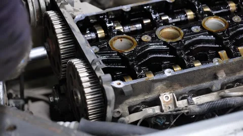 Mechanic hand repairing car engine components in service station 動画素材 318139727