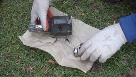 Mechanic Hands Examining CV Joint Tripod Journal Bearing Stock Footage 338433781