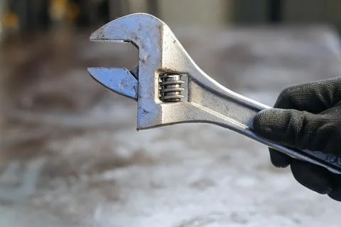 Mechanic Holding Adjustable Wrench Tool. Stock Photos