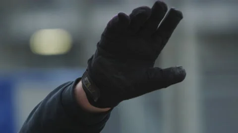 Mechanic holding hand at Pitstop at Car Race - Slow Motion - Racing engineer Stock Footage 146193378