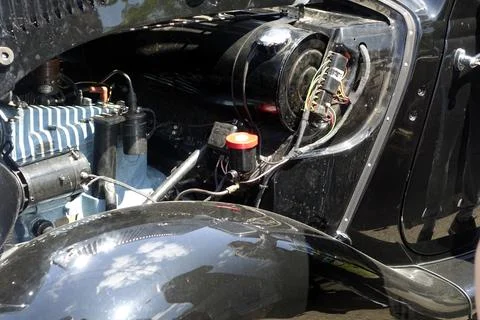 Mechanic Inspecting Engine Classic Black Car Mercedes-Benz 170v During a Vi.. Stock Photos