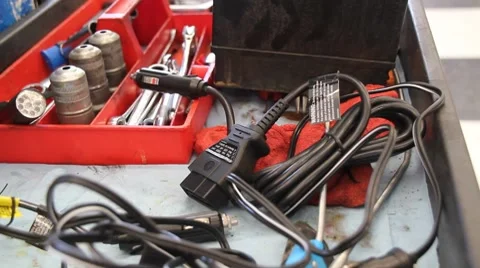 Mechanic looking for the correct tool on a tool cart 動画素材 7904259