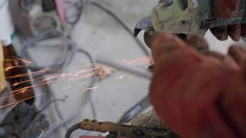 Mechanic man hand use grinding machine on metal working Stock Footage 149505749