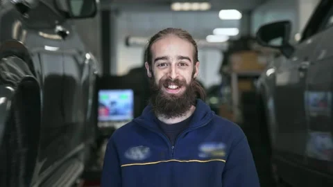 Mechanic man portrait. Technician guy work at auto service. Car fix workshop. Stock Footage 271222892