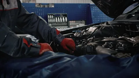 Mechanic man working at workshop. Video stock 131739615