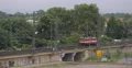 Mechanic Manipulate Heavy Electric Locomotive Maneuver Train Passing Low Motion 4k or 4k+ Resolution