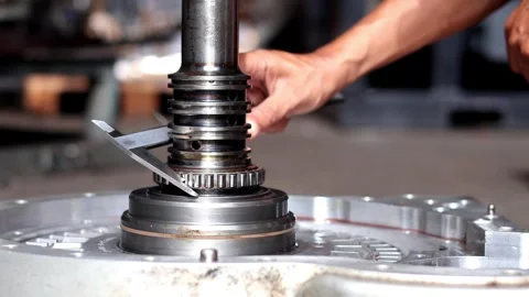 Mechanic measuring machine shaft diameter with vernier caliper tool. Stock Footage 340978063