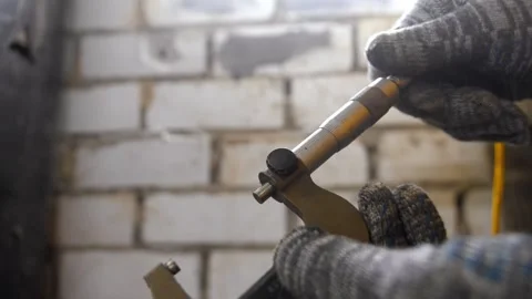 Mechanic measuring with a precision micrometer tool 스톡 동영상 329103686