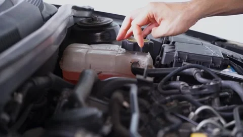 mechanic opened the radiator cap to chec... | Stock Video | Pond5