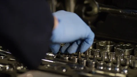 Mechanic opening a case and picking tools for the job 스톡 동영상 102532546