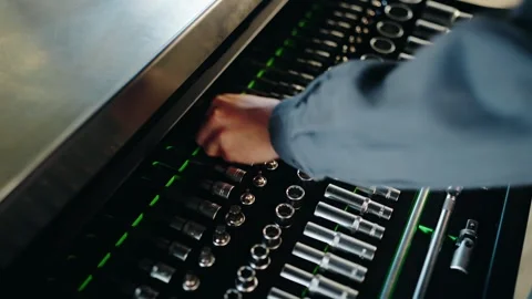 Mechanic Opening Tool Drawer in Workshop Stock Footage 333634609