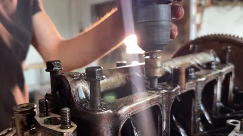 Mechanic performing diagnostics, disassembling car engine for maintenance Stock Footage 315392605