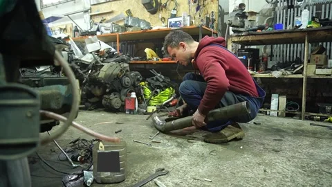 Mechanic performs cleaning work Video stock 235725920