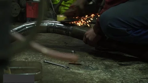 Mechanic performs cleaning work Stock Footage 235725925