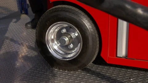Mechanic pushing tool cabinet in slow motion Stock Footage 74764829