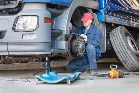 Mechanic repair truck is on the Jack Stock Photos