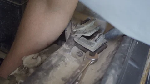 Mechanic repairs a car engine closeup Stock Footage 126150910
