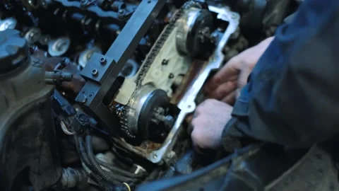 The mechanic repairs the engine Stock Footage 152728319