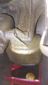 Mechanic Replacing O-Ring in Engine Oil Filter Adapter to Fix Leakage Stock Photos