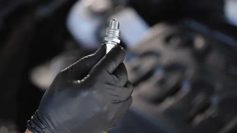 Mechanic Replacing Spark Plug in Car Engine Stock Footage 315145078