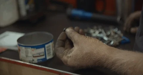 Mechanic Searching Through Screws 스톡 동영상 105244327
