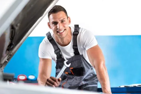 Mechanic with spanner Stock Photos