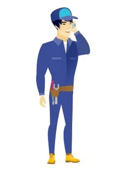 Mechanic talking on a mobile phone Ilustración de archivo