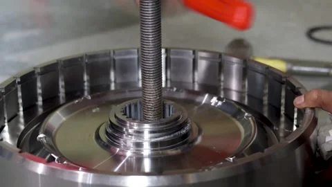 Mechanic Tapping Transmission Piston Using Soft Hammer During Gearbox Assembly. 動画素材 344545742