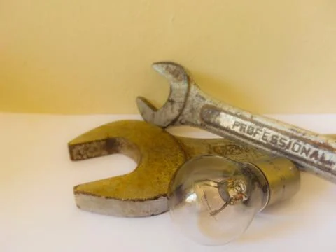 Mechanic Tools: Two old rusty simple wrenches and one lamp off. Taken close u Stock Photos