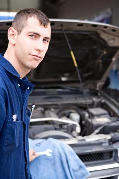 Mechanic: trustworthy mechanic by SUV Stock Photos