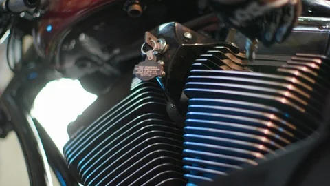 The mechanic is twisting bold in a motorcycle Stock Footage 120608938