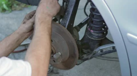 Mechanic Using Brake Cube Stock Footage 21601665