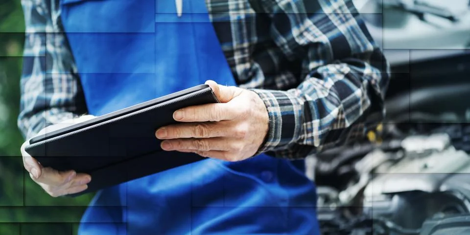 Mechanic using digital tablet for checking car engine, geometric pattern Stock Photos