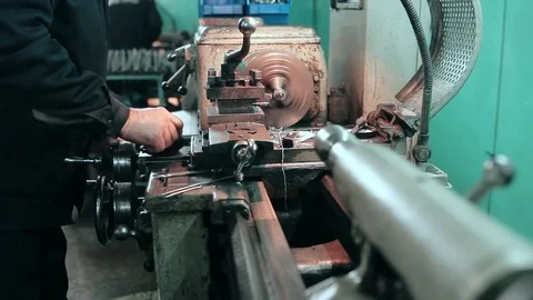 Mechanic using industrial lathe machine Stock-Footage 70566813