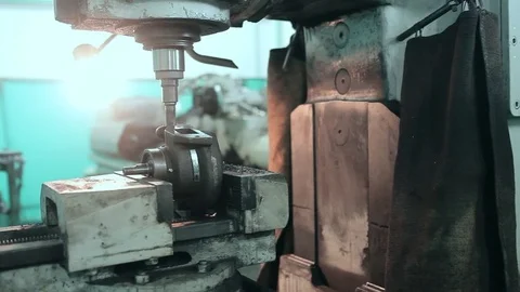 Mechanic using industrial lathe machine Stock Footage 70566953