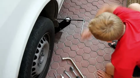Mechanic using jack. Stock Footage 8833335