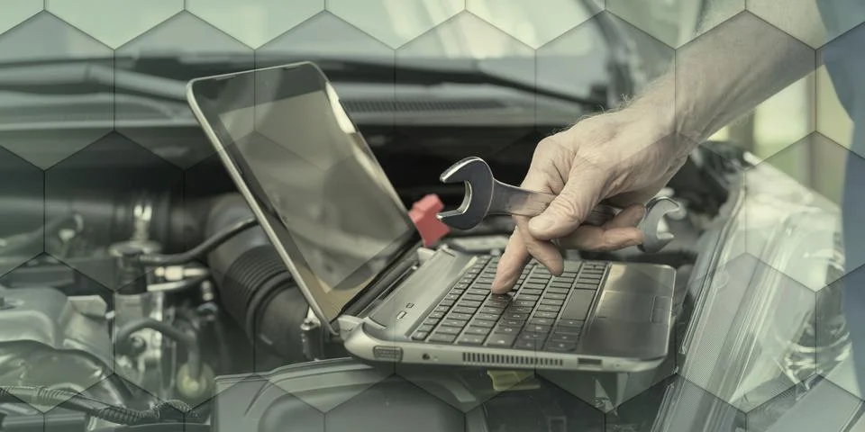 Mechanic using laptop for checking car engine, geometric pattern Stock Photos