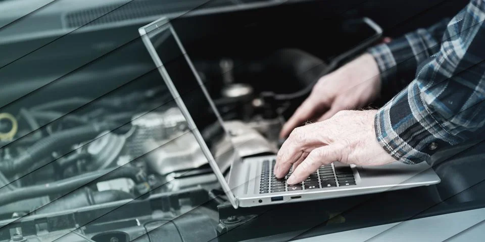 Mechanic using laptop for checking car engine, geometric pattern Stock Photos