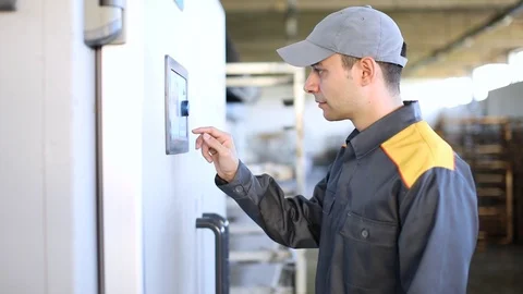 Mechanic using a touch screen Stock Footage 96016377