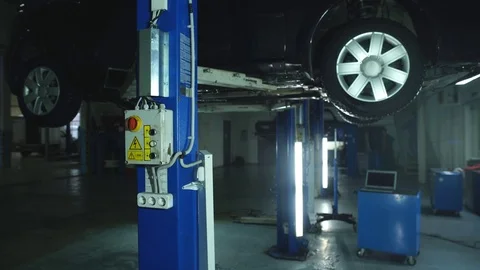 A mechanic at work in his garage Stock Footage 70649730