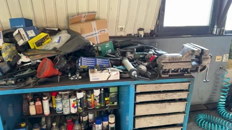 Mechanic workbench packed with tools in auto repair shop Stock Footage 340346768