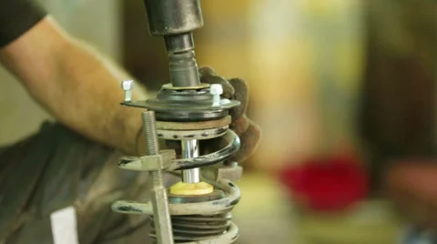 Mechanic working at auto repair workshop Stock-Footage 36545749