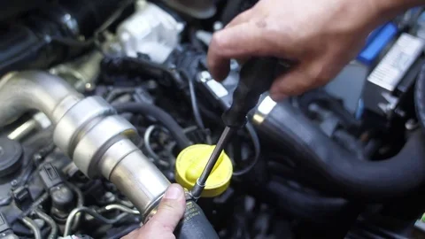 Mechanic working on car engine 4k Stock Footage 82733222