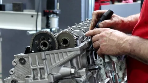 Mechanic working on car engine Stock Footage 197417132